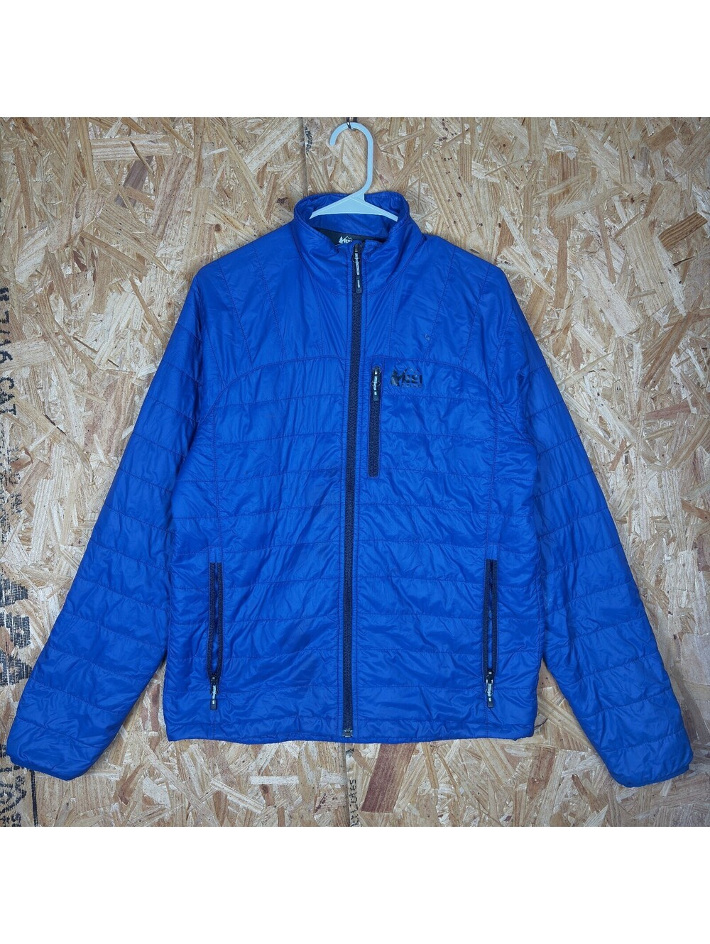 REI Co-op blue insulated jacket